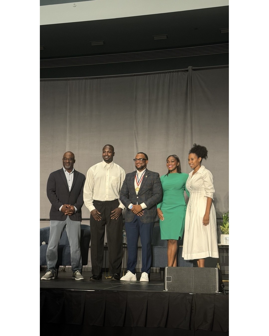 Dr. April Spencer, wearing green, with fellow National Medical Association symposium participants